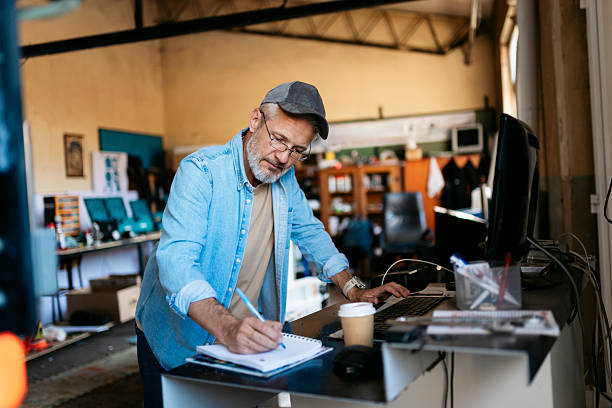 A business owner reviewing his finances